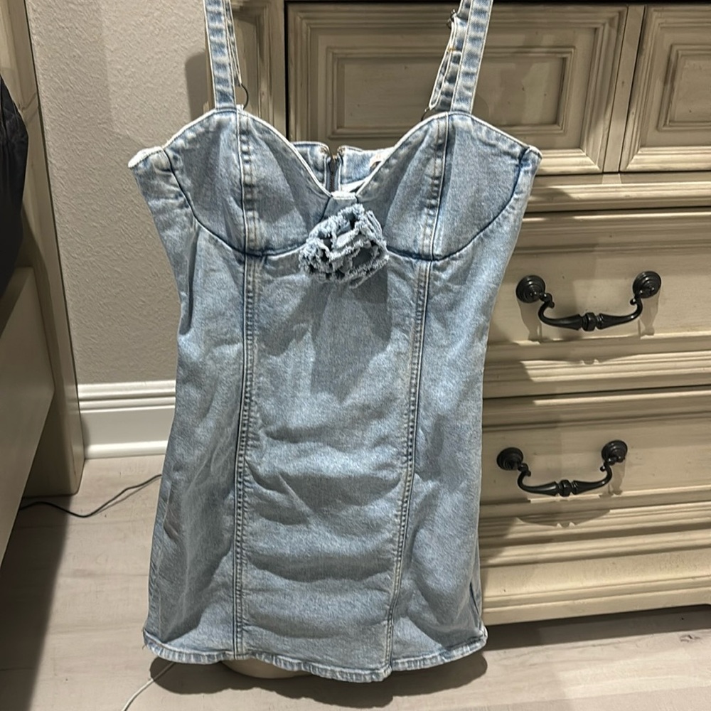 GB Jean dress with adjustable straps! Has bow on the front